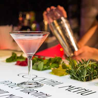 Craft cocktail served at illuminated LED event bar